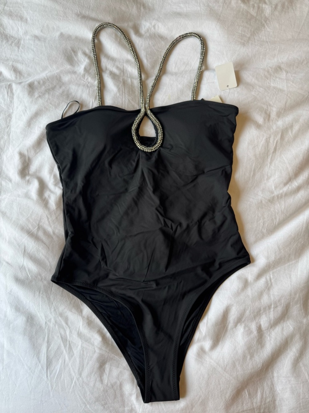 Black One-Piece Swimsuit with Decorative Straps